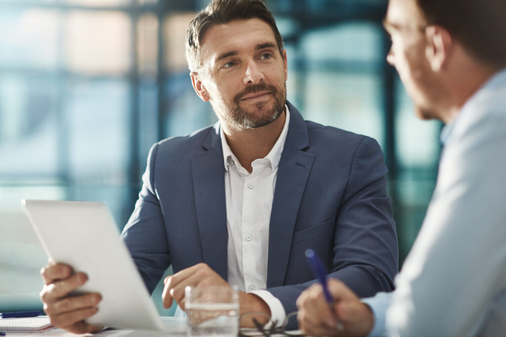 "A commercial leasing lawyer discussing contract terms with a business client.